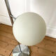 Vintage floor lamp has two opaque glass spheres