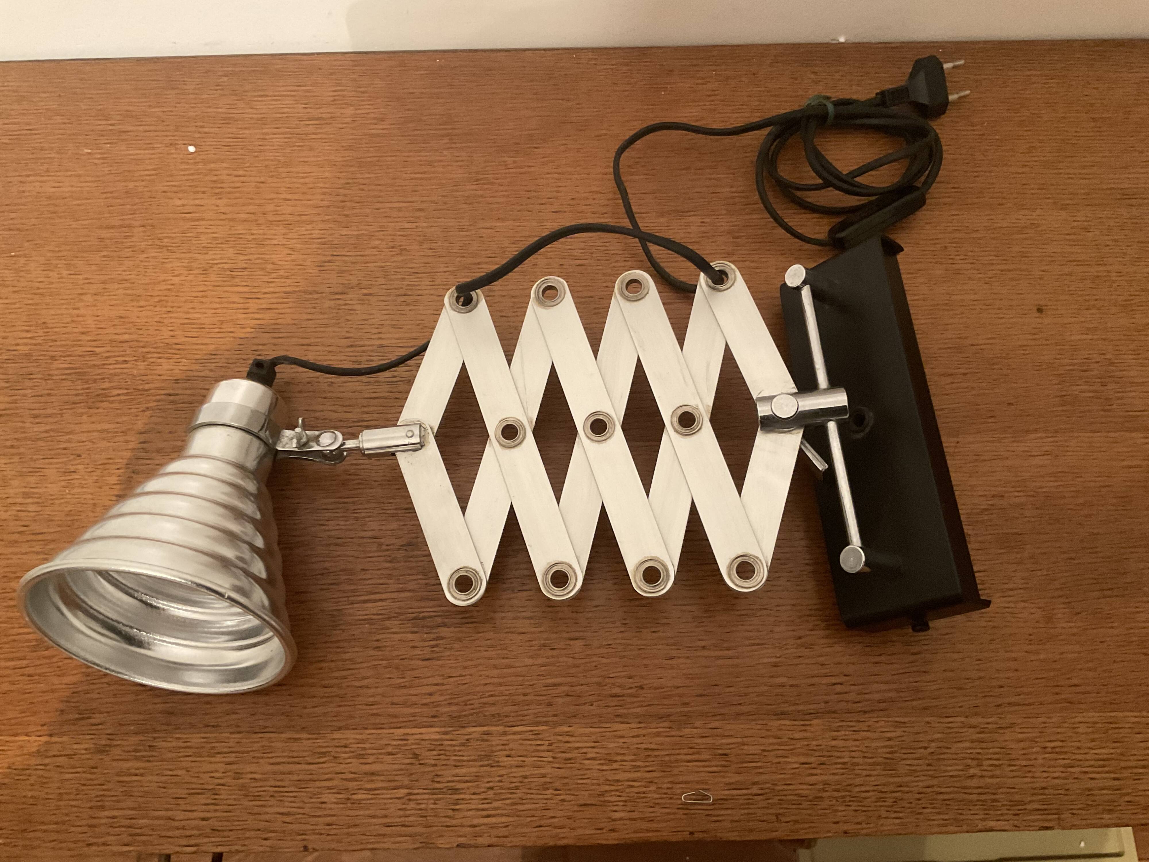 Industrial accordion wall light