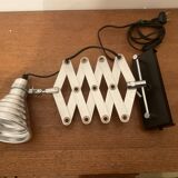 Industrial accordion wall light