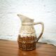 Pitcher in flamed sandstone