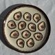 Large circular platter with compartments for shellfish, molluscs, and oysters.