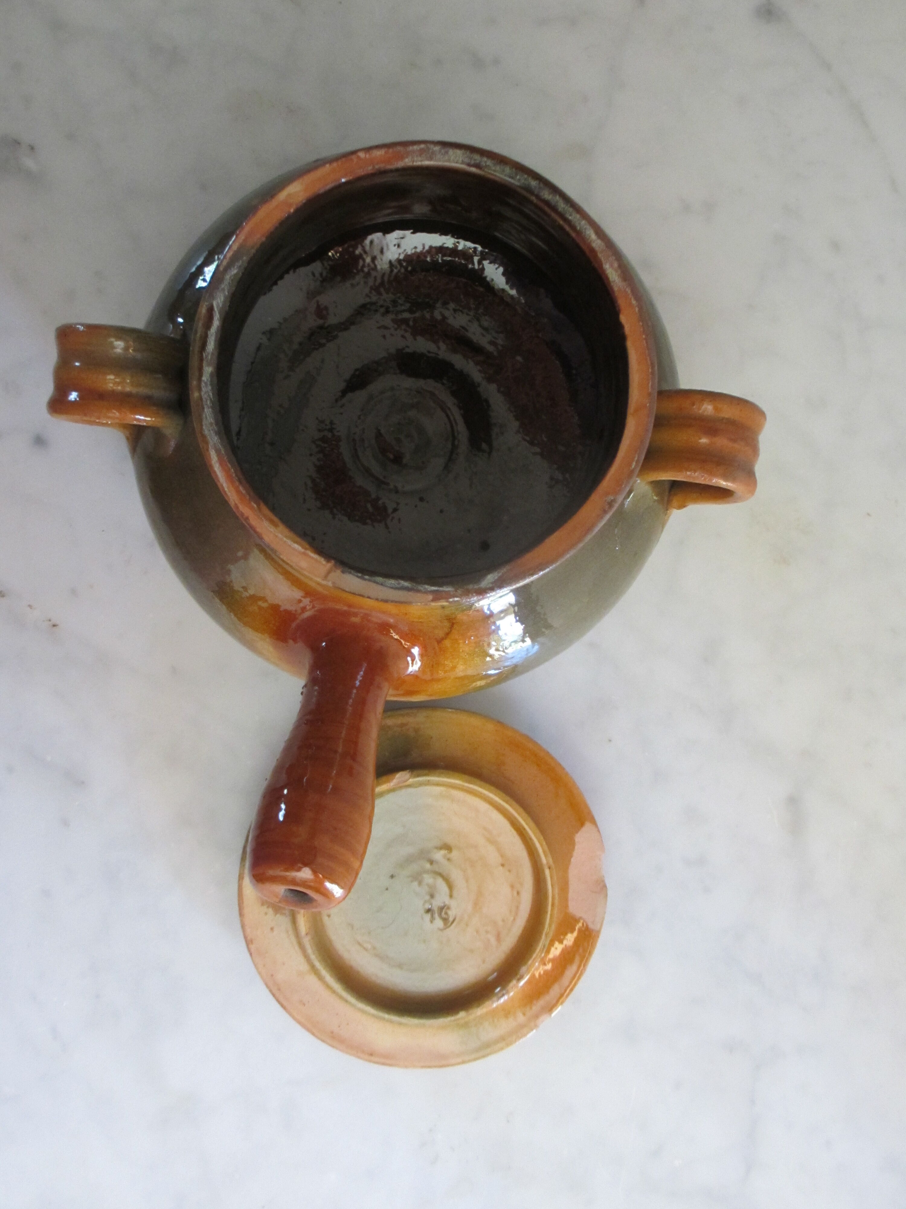 Pignate (in Provence) or glazed terracotta pot.