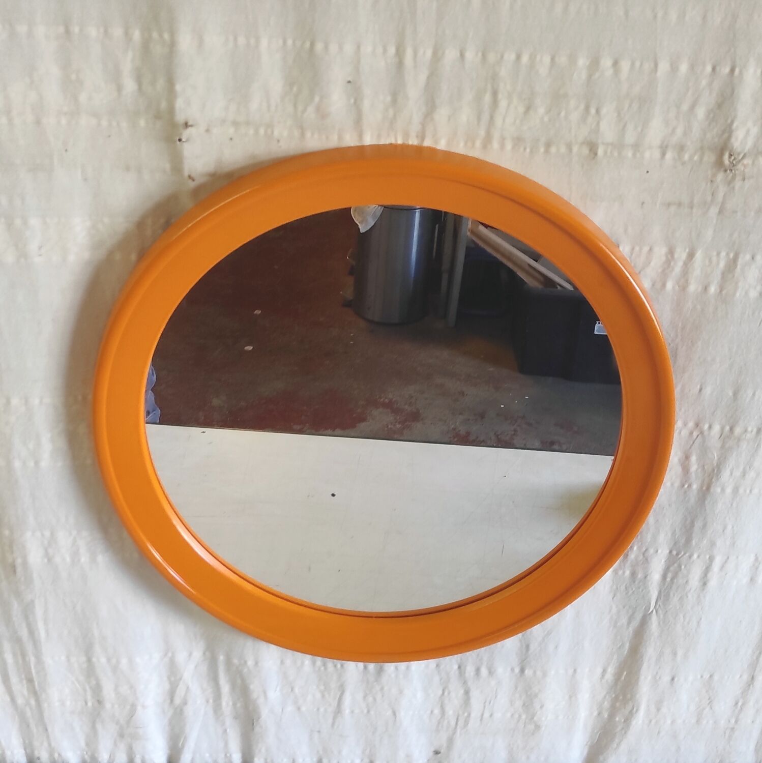 Round orange plastic mirror - 1970s