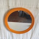 Round orange plastic mirror - 1970s