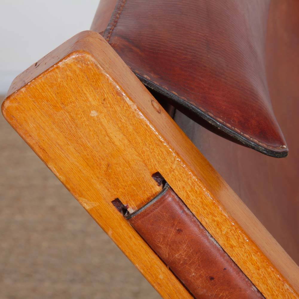 Pair of large wooden and leather armchairs from the 1980s