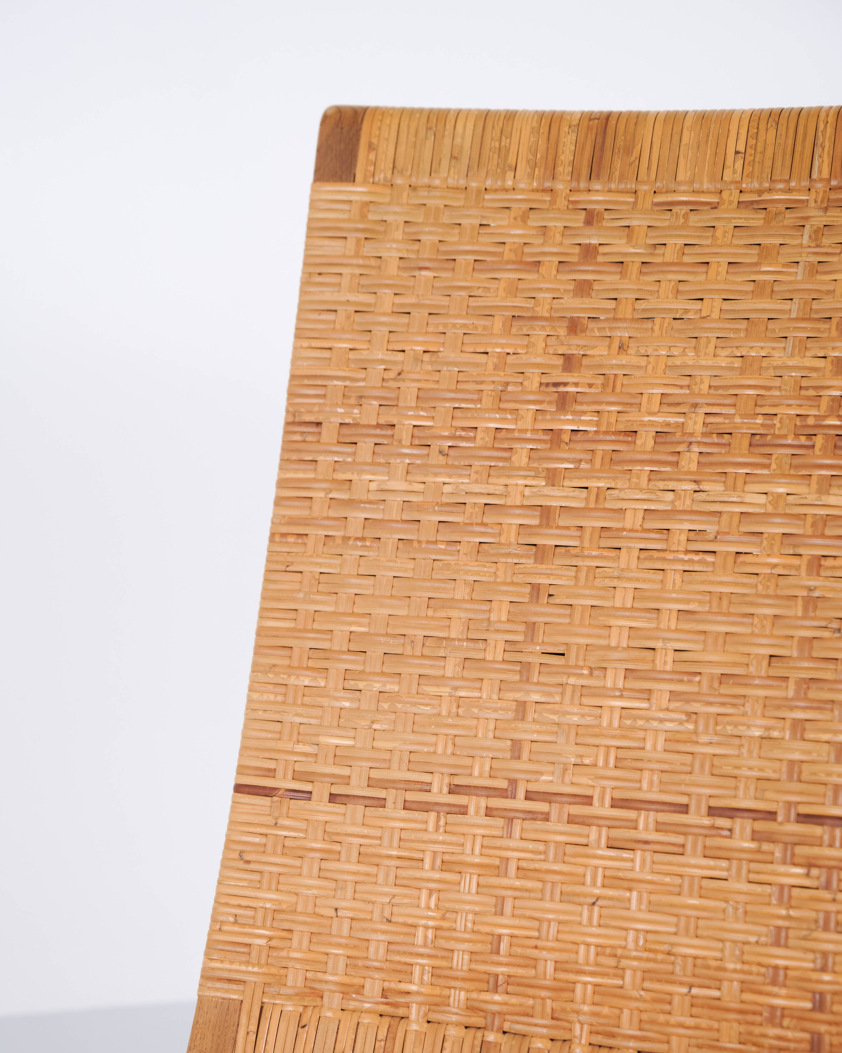 Armchair / folding chair – model JH 512 “The Fireplace Chair” – patinated oak – original cane – Hans J. Wegner – Johannes Hansen – 1950s