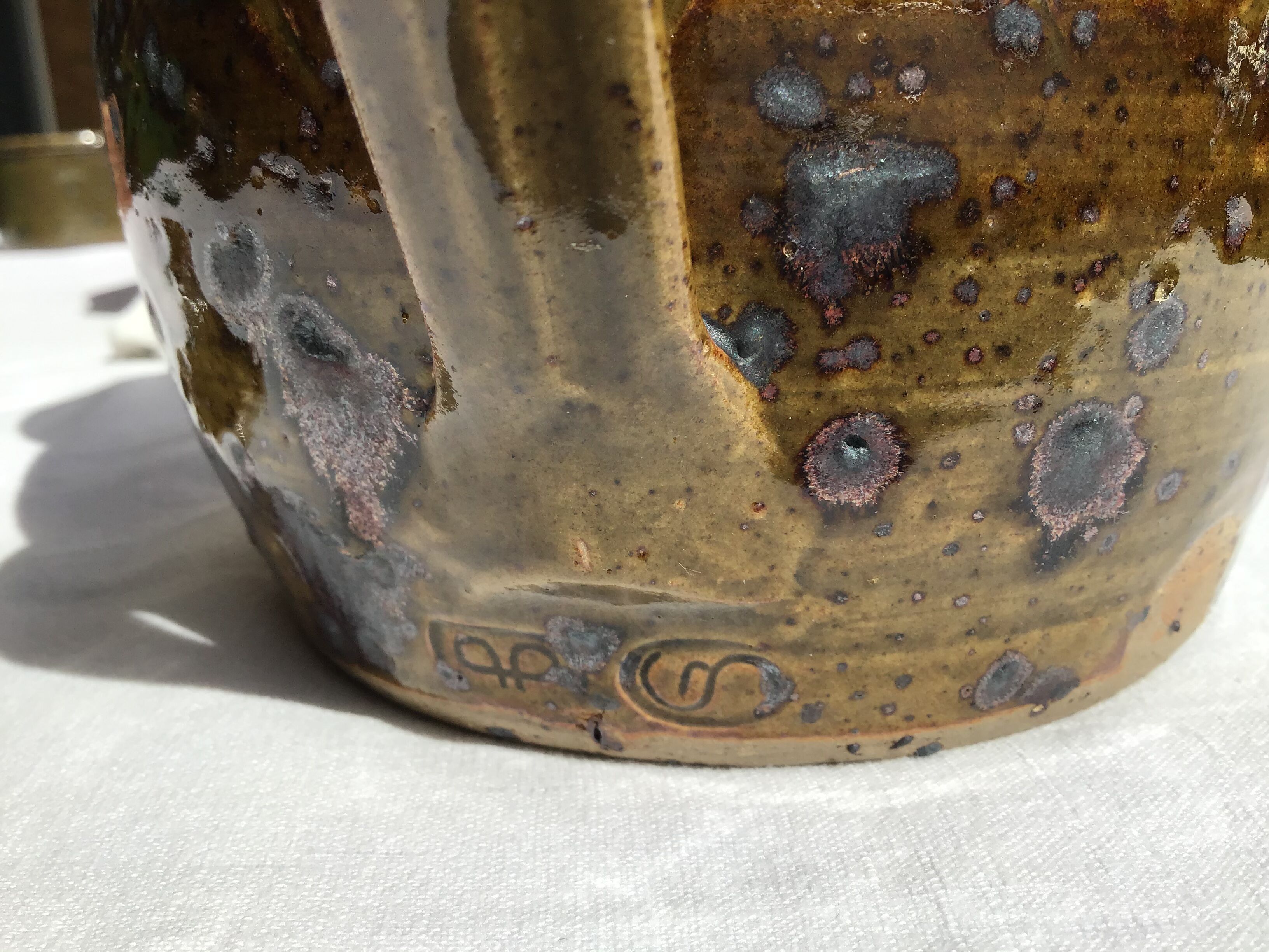 Signed olive green pyrity sandstone tea