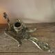 Brass candle holder cave rat peacock