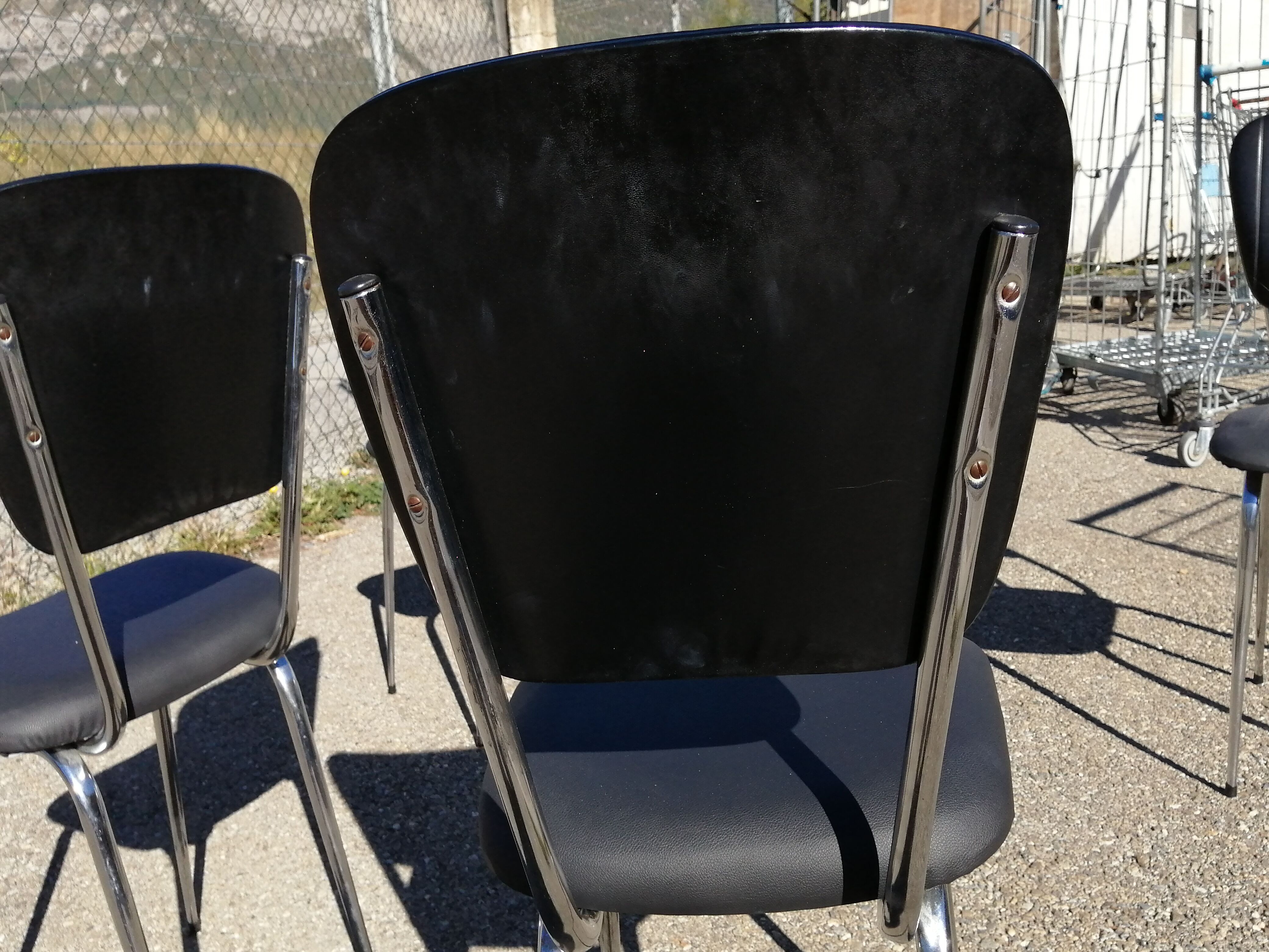 Series of 4 vintage black skai chairs - Vanac Aix