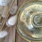 Chiseled brass candle holder