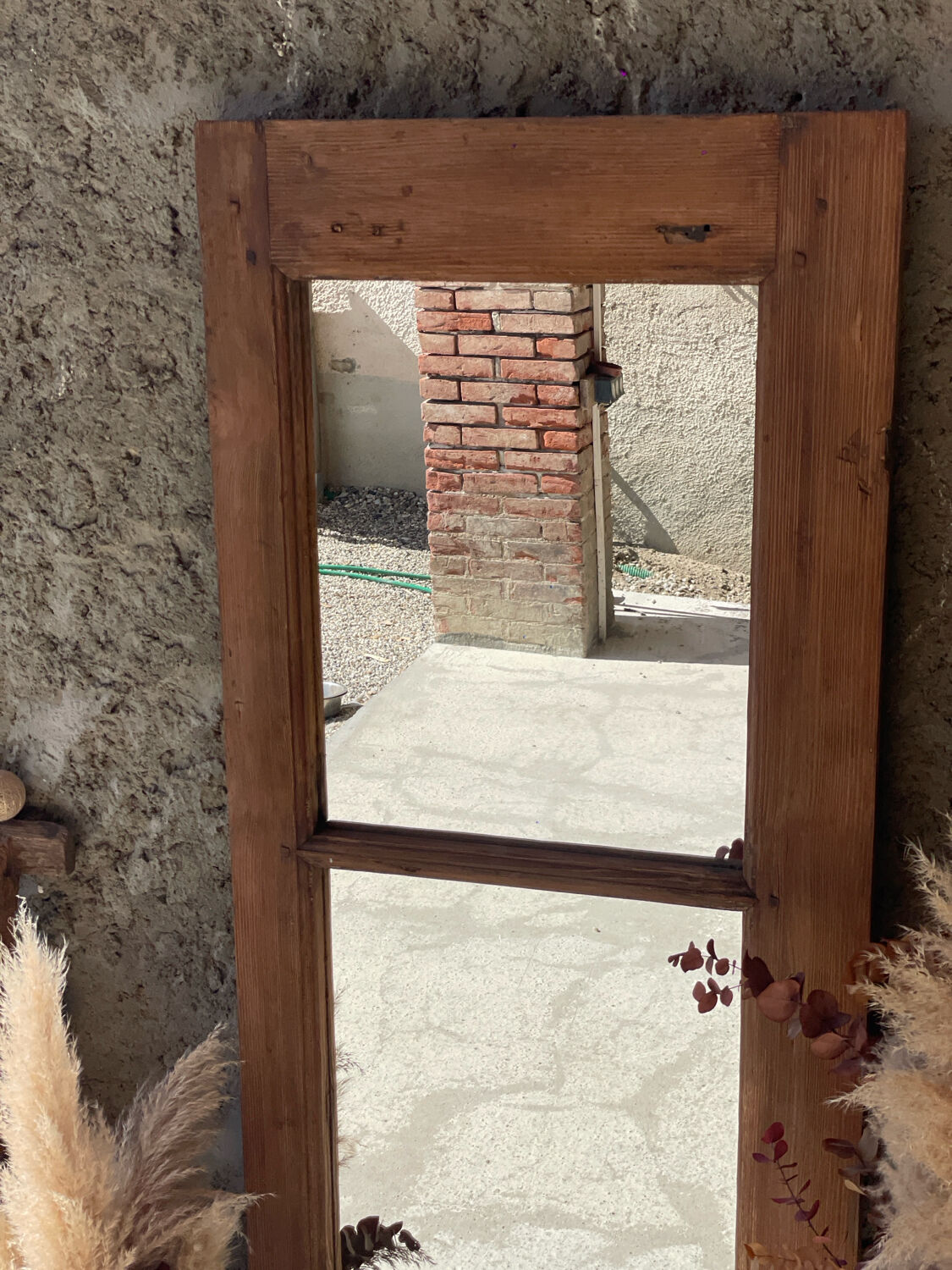 Hanging wooden mirror