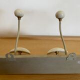 Wall-mounted coat rack with ceramic