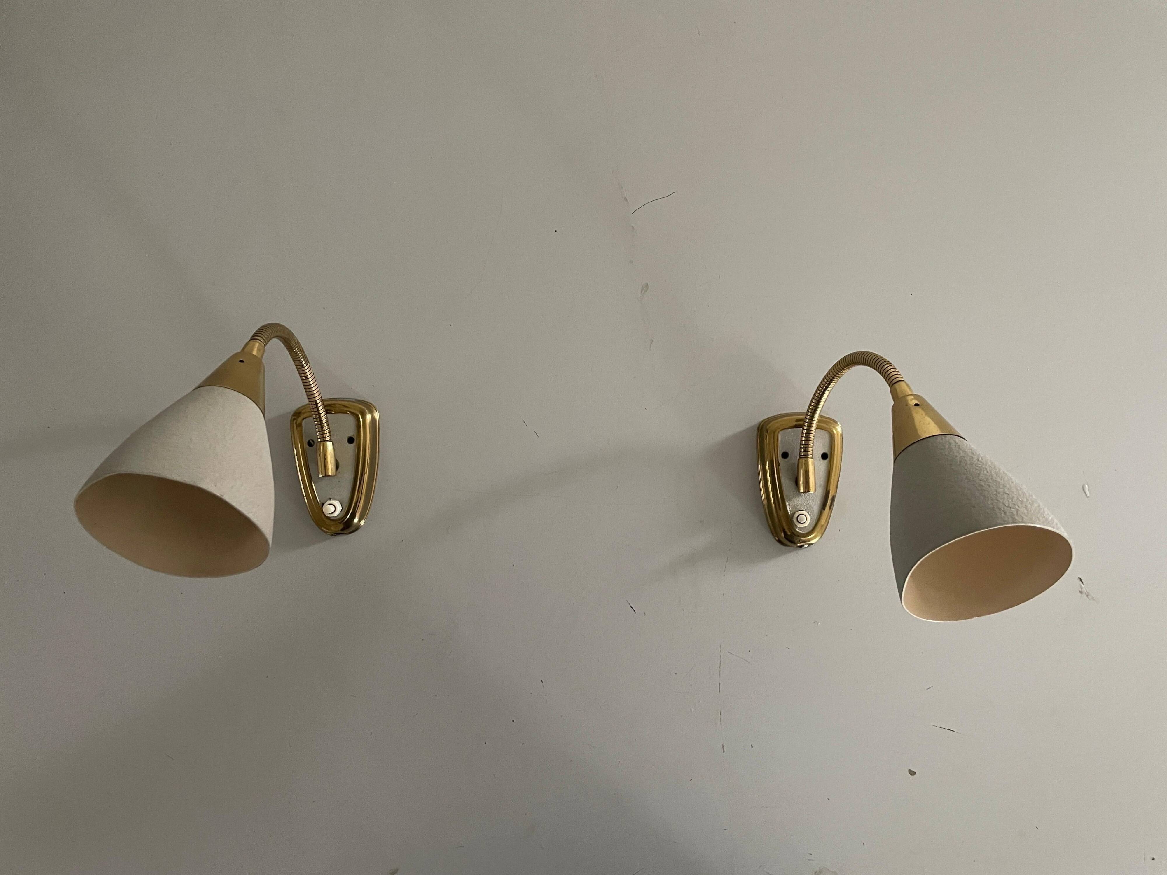 Pair of grey metal and brass wall lights, 1960s, Germany