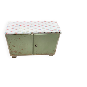 Vintage low wooden cabinet painted green and white with a floral fabric top (1950s)