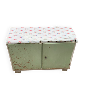 Vintage low wooden cabinet painted green and white with a floral fabric top (1950s)