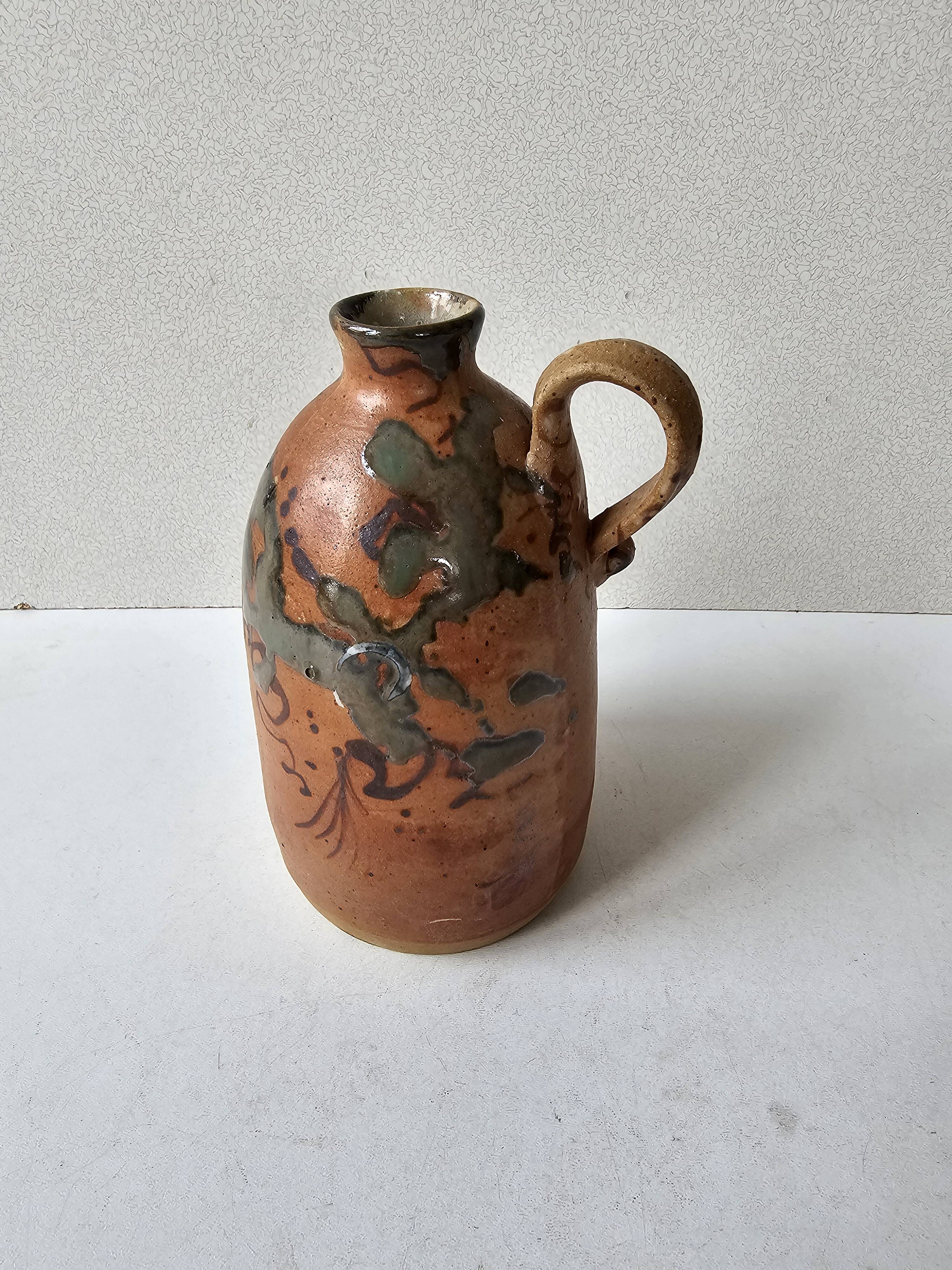 Ceramic handle soliflore vase with an unidentified signature