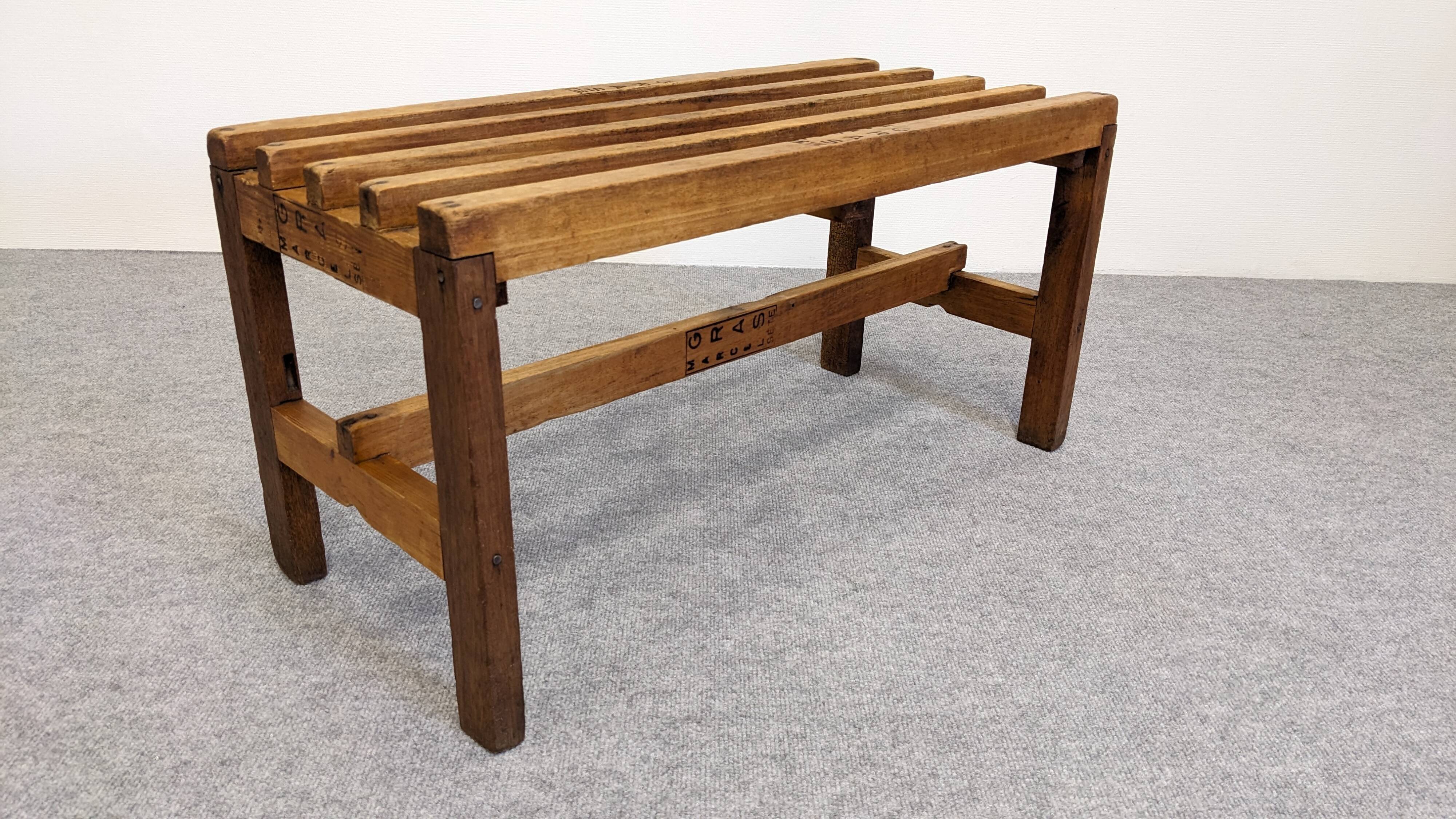 Wooden slatted display bench or support, France circa 1960.