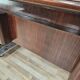 Art Deco executive desk in exotic wood, glass, and brass.