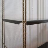 Black and gold metal tomado wall shelf