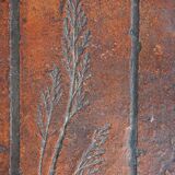 Coffee table with ceramic top and herbarium decor by pierre garnier