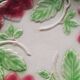 Six slip plates with strawberry decoration