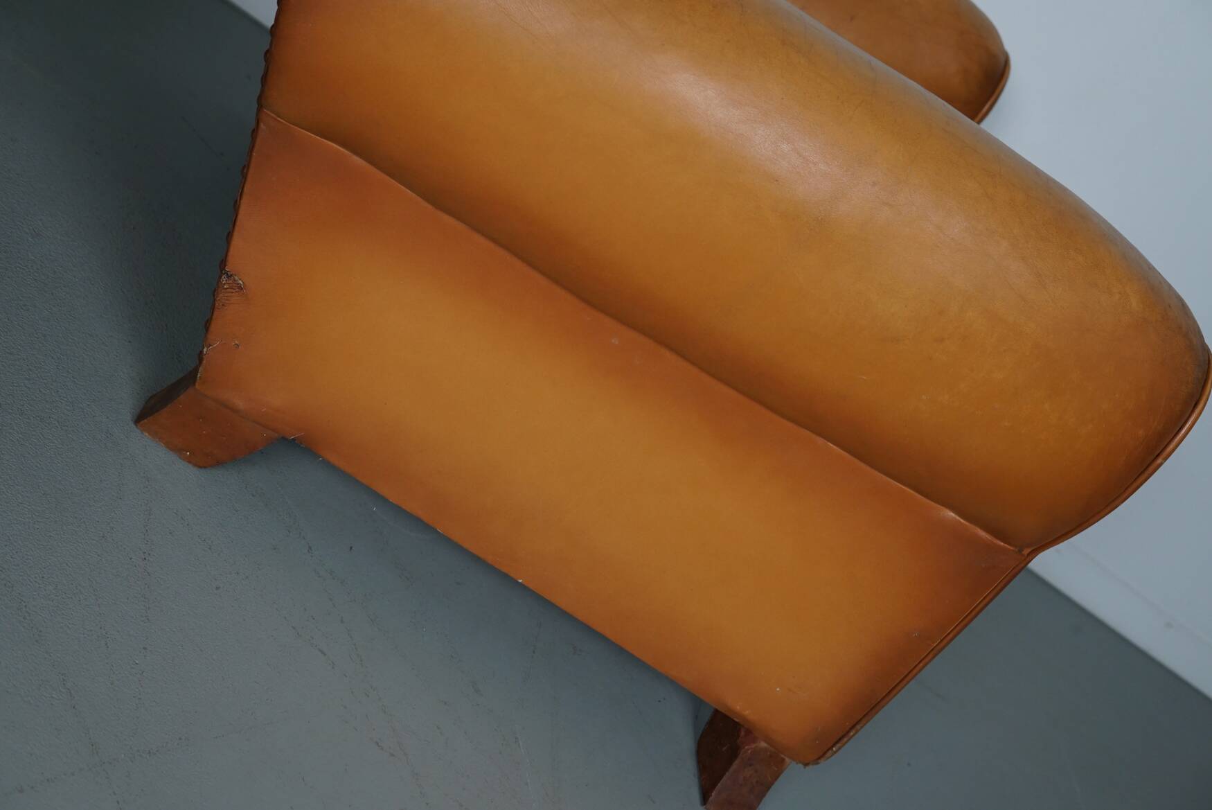 Pair of French Cognac Moustache Back Leather Club Chairs, 1950s