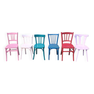 Set of 6 mismatched vintage bistro wooden chairs.