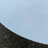 White dining table with a central pedestal, extendable, from the 1970s.