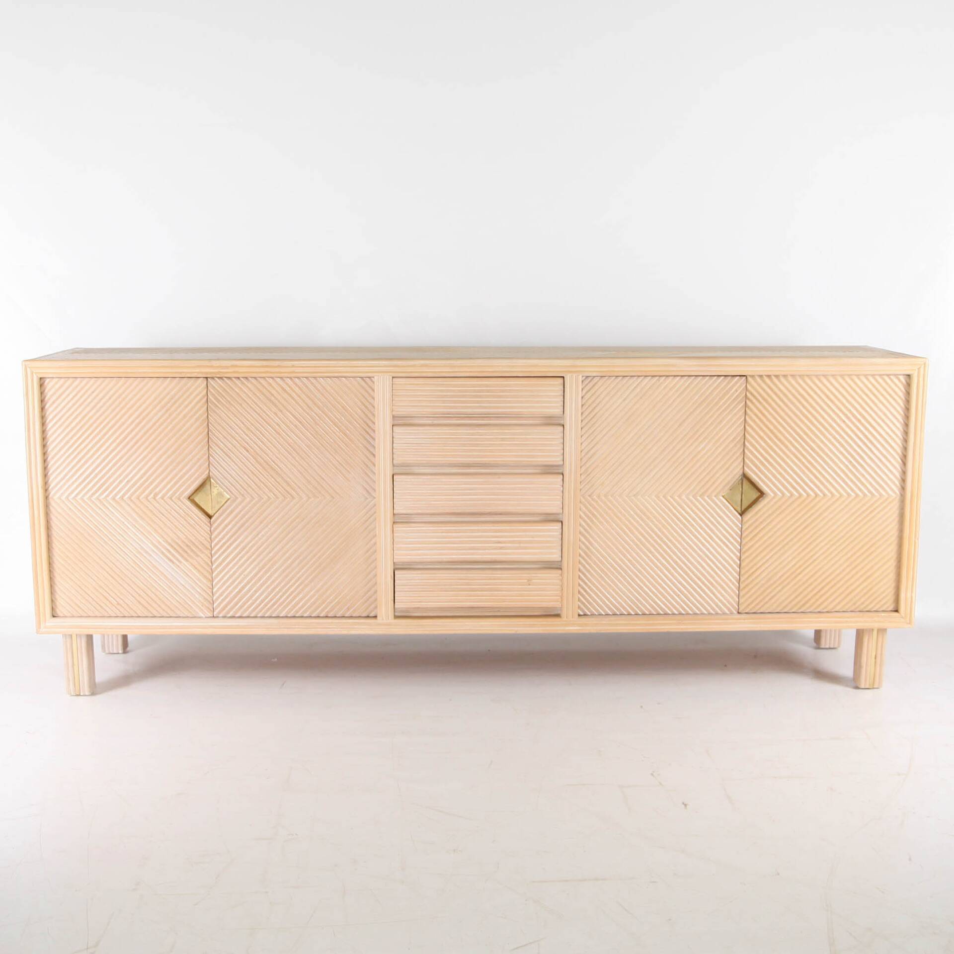 Rattan and brass sideboard