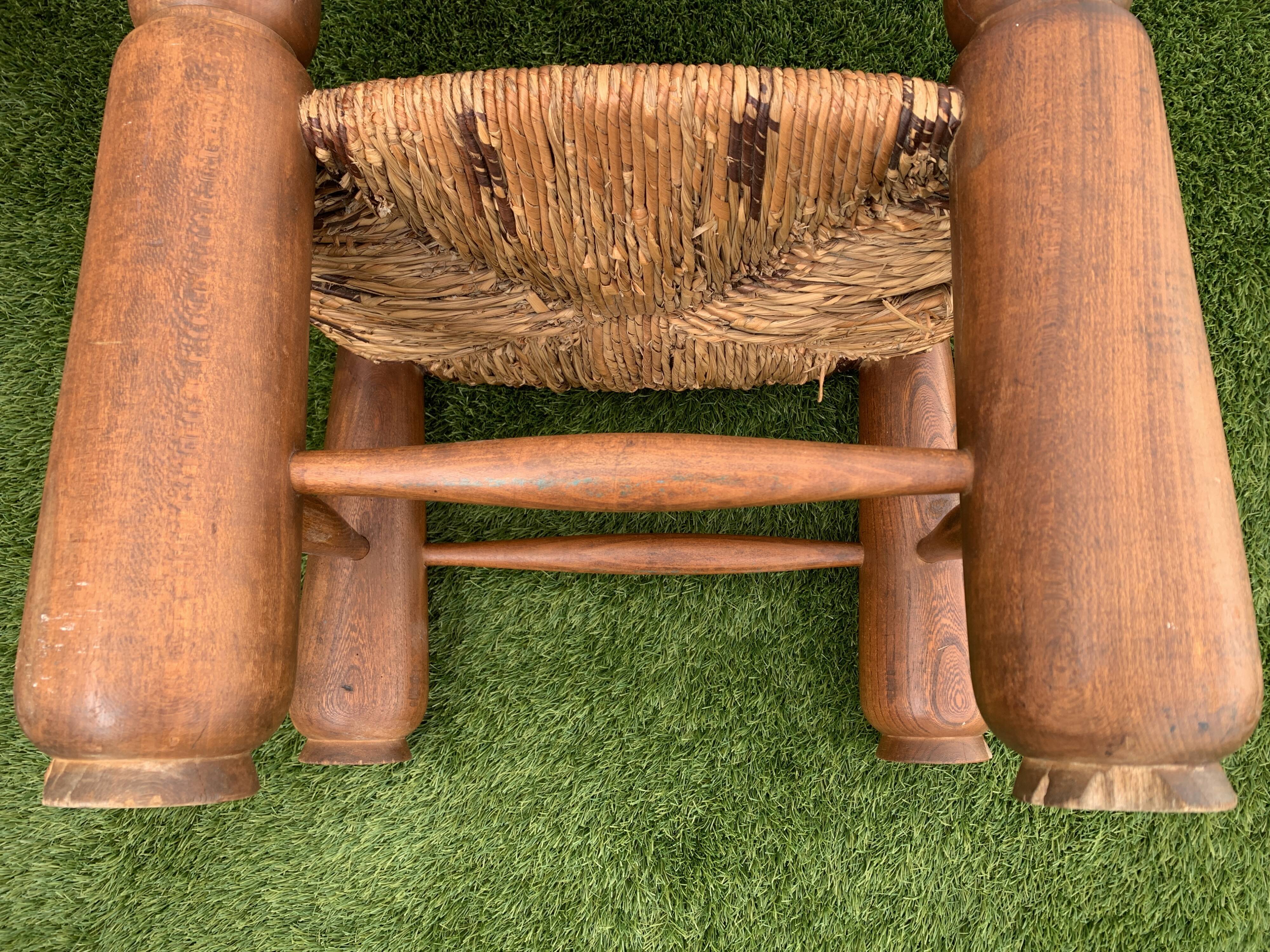 Pair of antique low fire chairs made of wood and straw