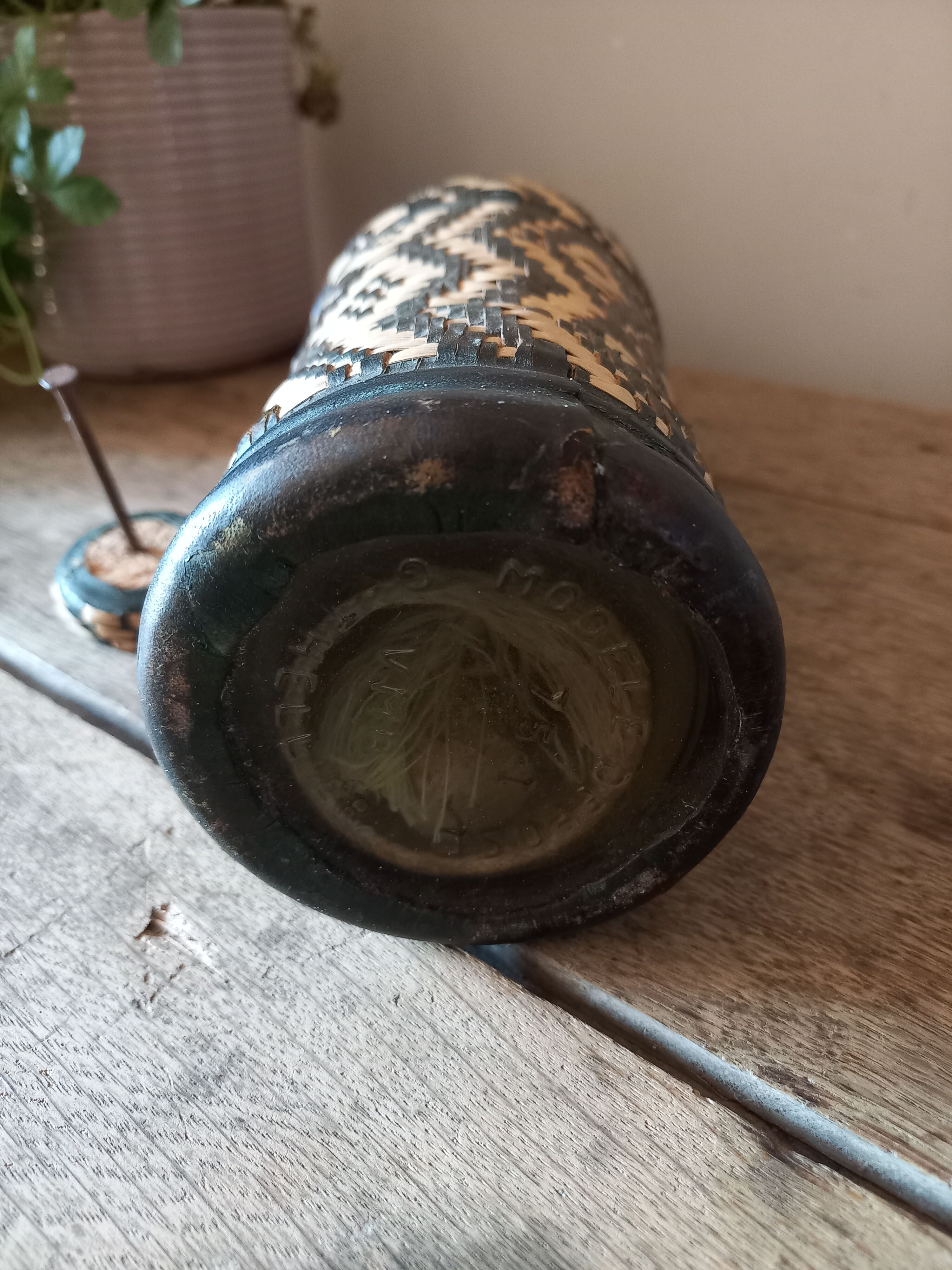 Bottle vase sheathing braided basketry and leather Ethnic Crafts