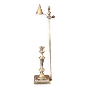 Candle holder with snuffer