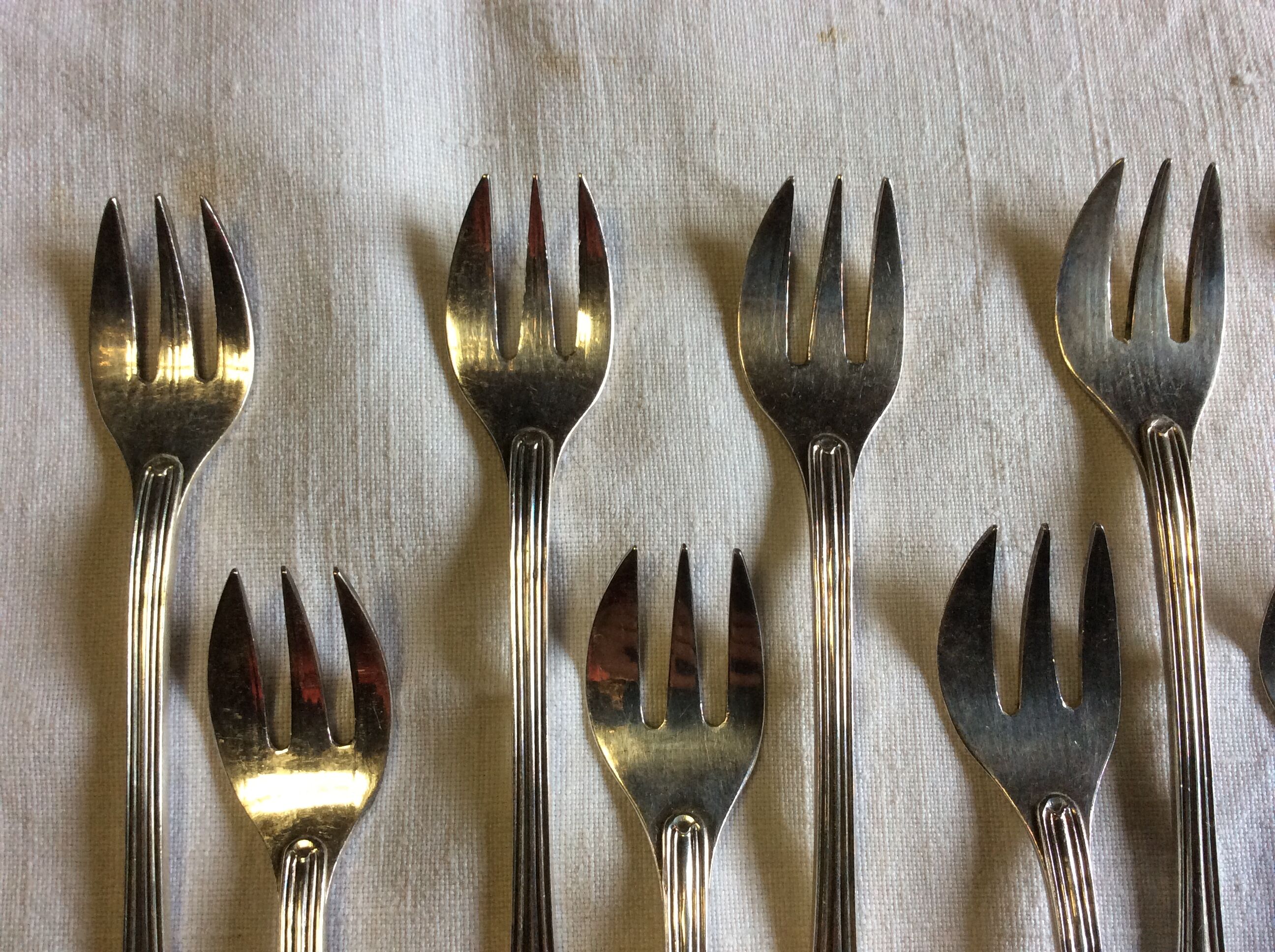 12 Christofle oyster forks in silver metal