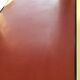 Double-footed red Formica wood spindles console
