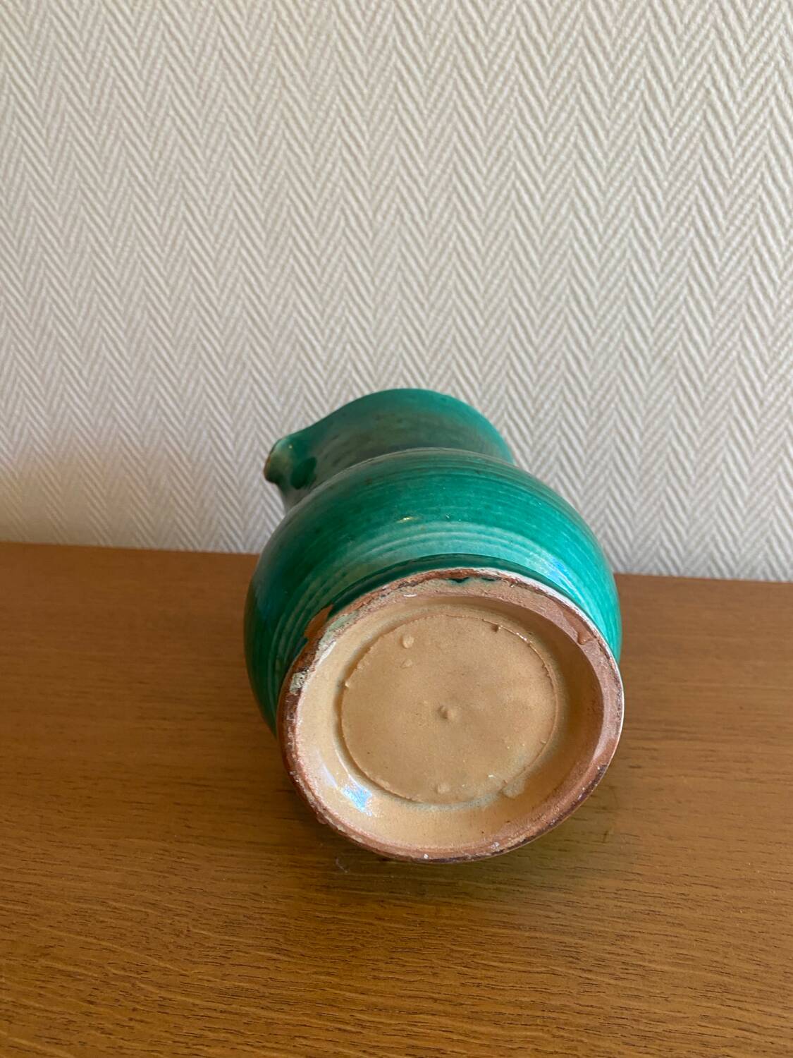 Green glazed ceramic carafe