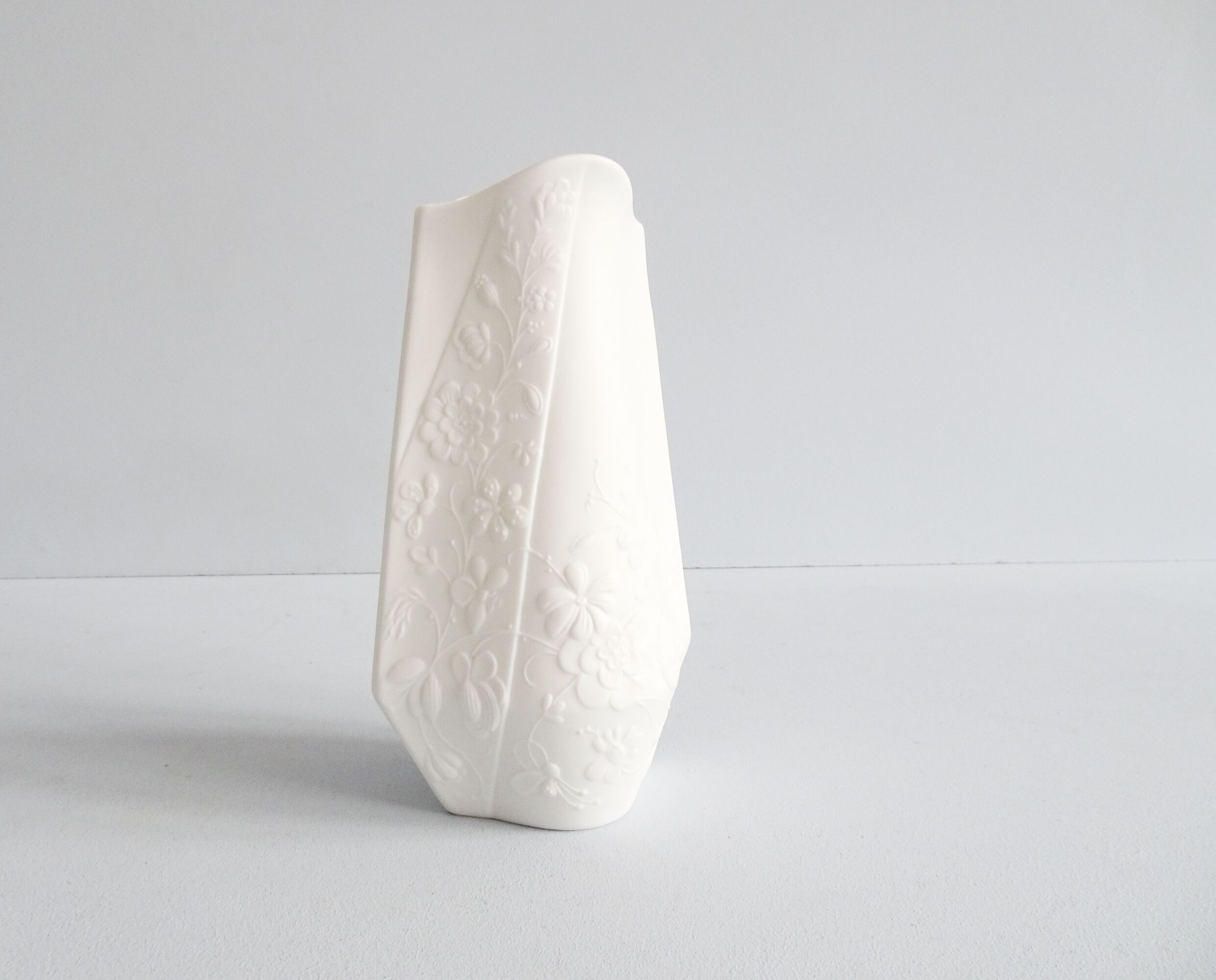 AK Kaiser bisque vase design M. Frey, white vase with flower relief