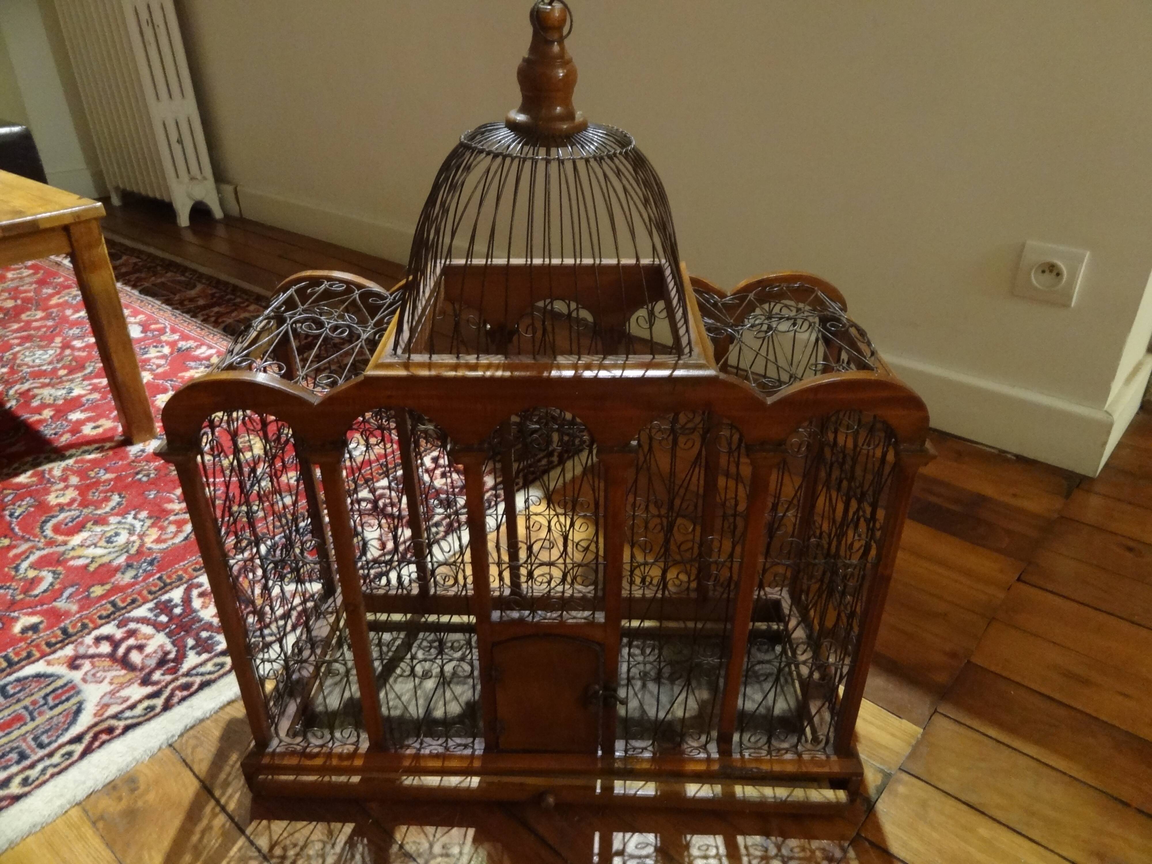 Exotic wooden and metal birdcage