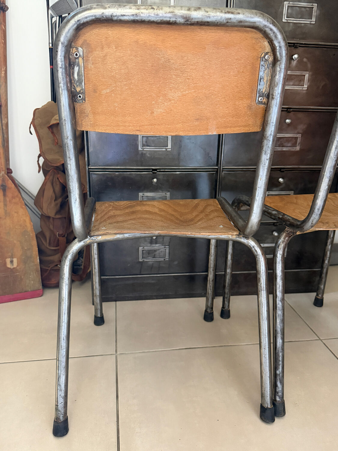 Pair of vintage adult school chairs in patinated metal