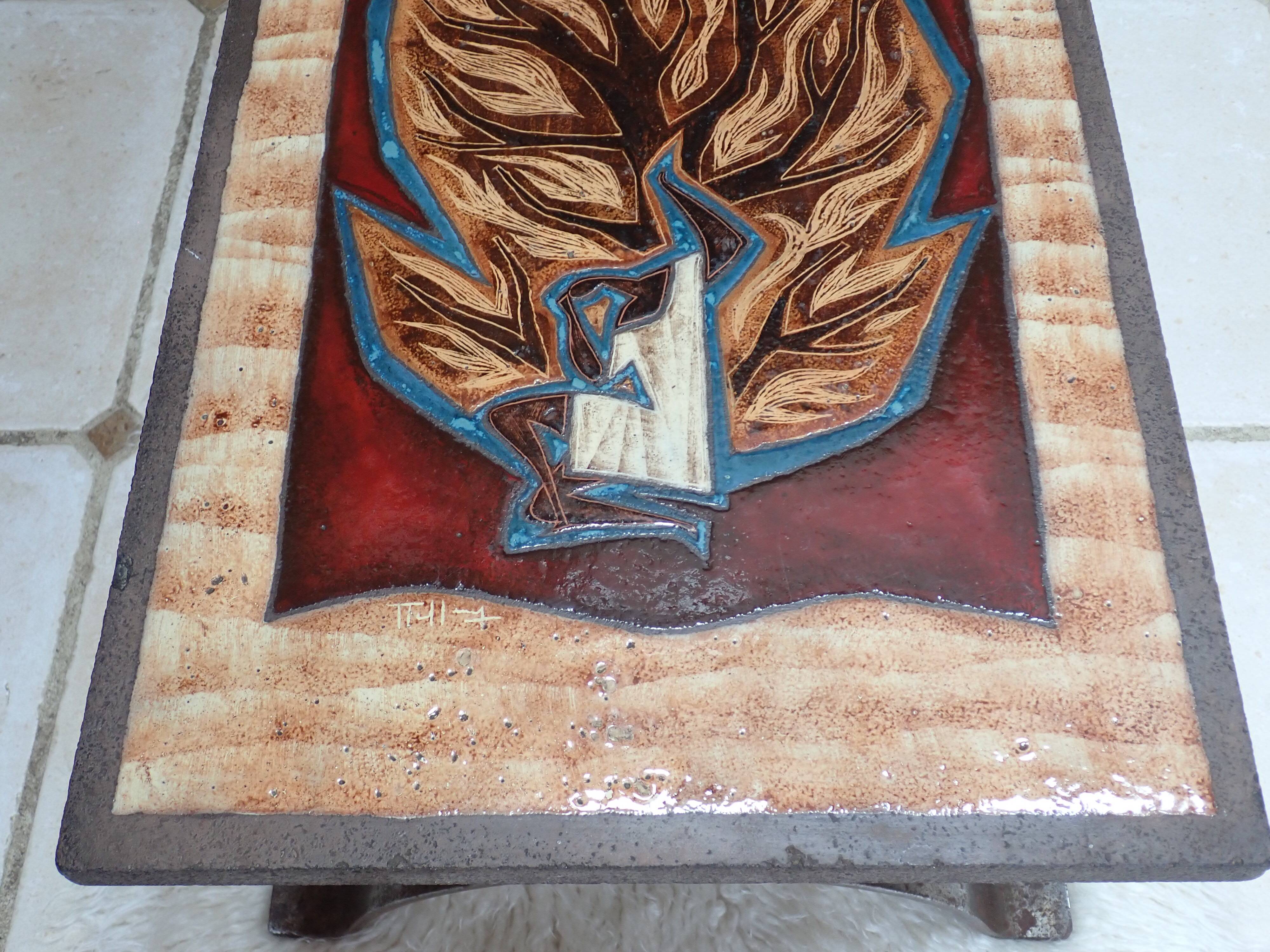 Enameled lava coffee table by Jean Jaffeux