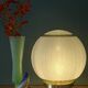 Lampe à poser globe vintage en verre granité vert et doré