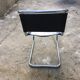 Chaise de bureau en cuir et chrome