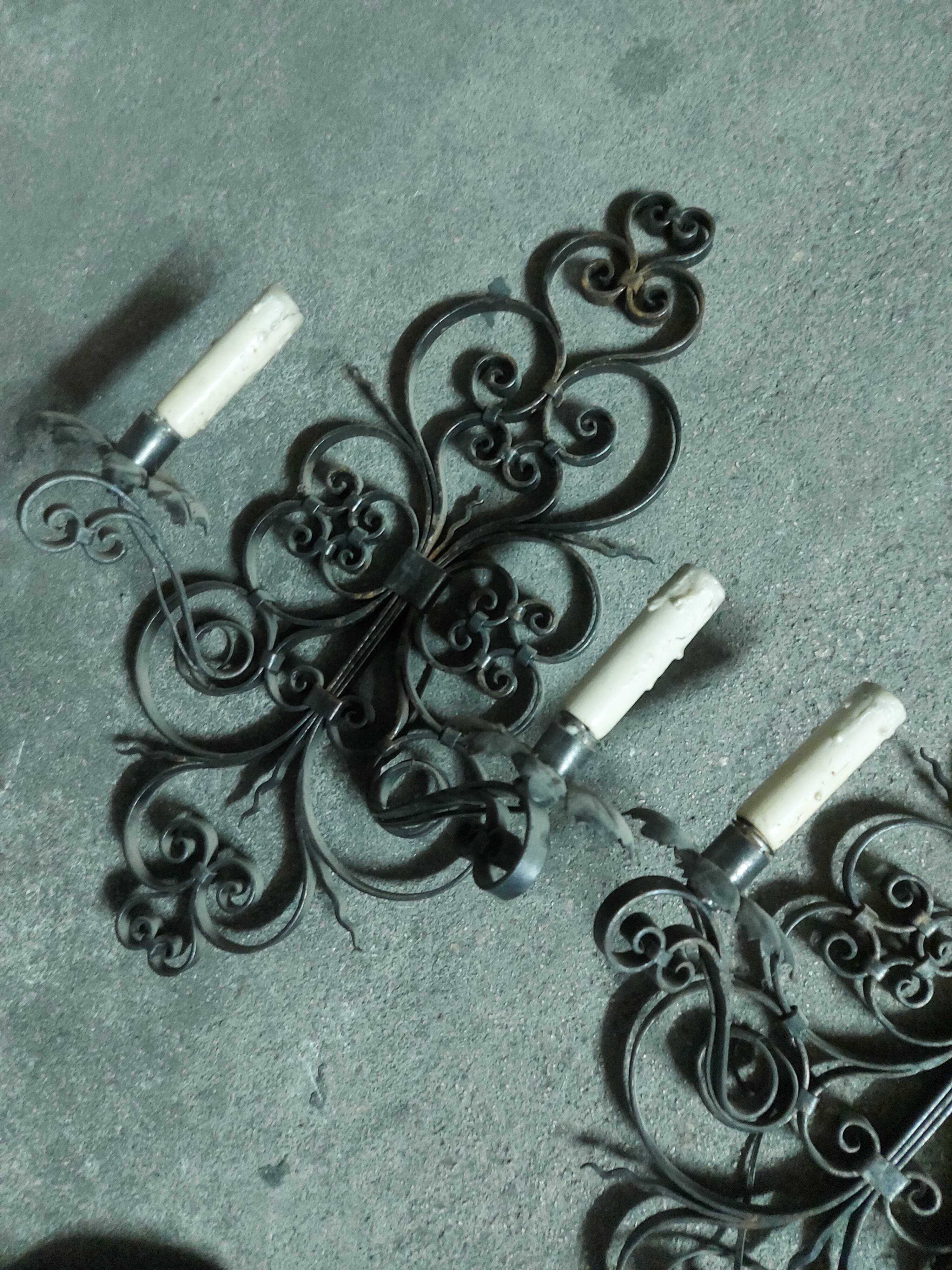 Two large wrought iron wall lights