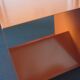 Side table, contemporary bedside table in orange metal