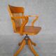Fauteuil de bureau tournant dit américain d'époque 1940