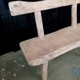 Old small farm bench in solid oak