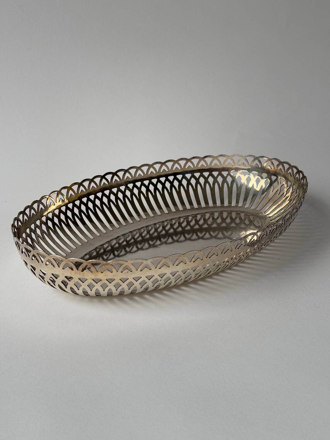 Vintage openwork basket in silver metal