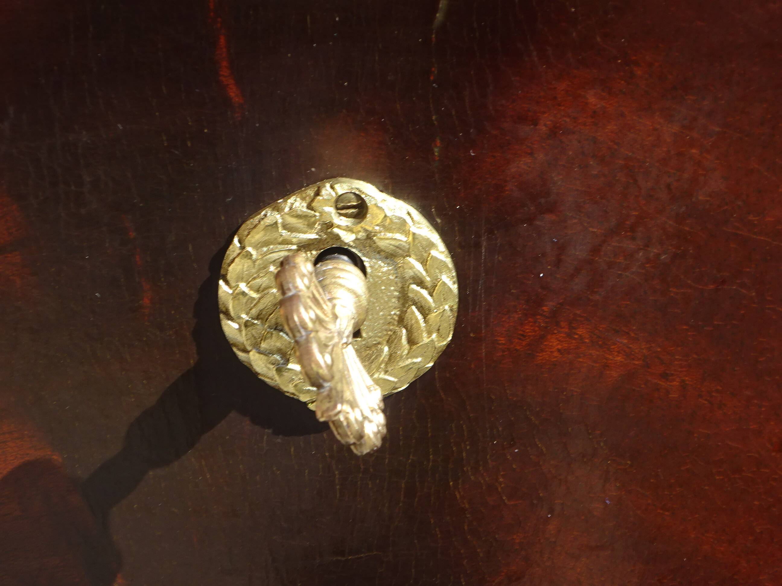 Flamed mahogany enfilade with sea green marble in Empire style.