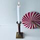 Old candle holder in brass and wood