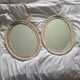 paire de miroirs ovales anciens