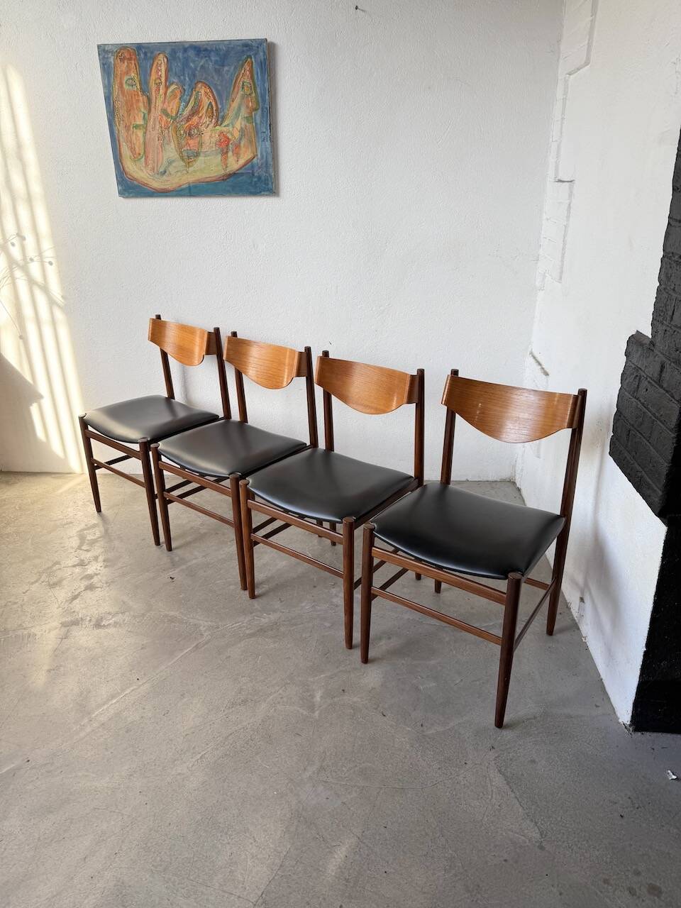 Set of 4 Italian chairs by Gianfranco Frattini.